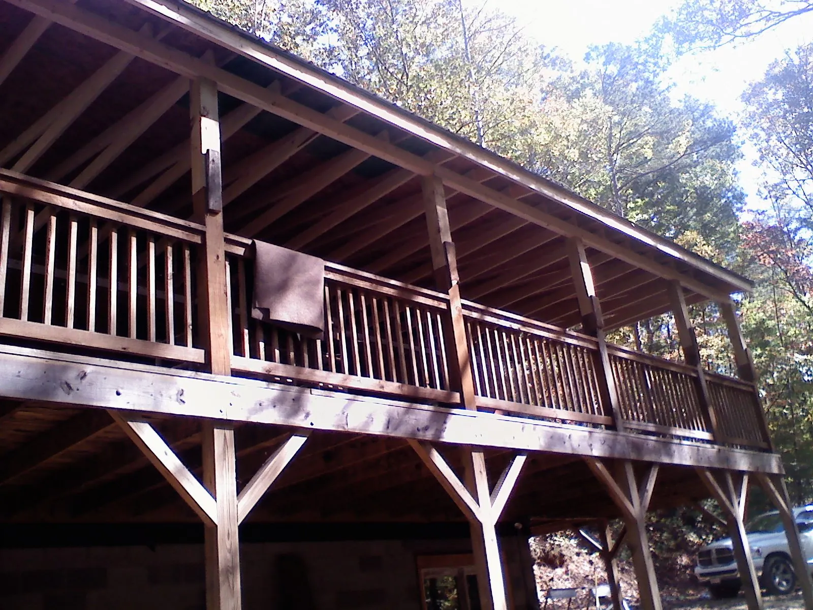 Timber framing under a new elevated porch and deck — Roof Leak Repair in Rosamond by Roofing Brothers